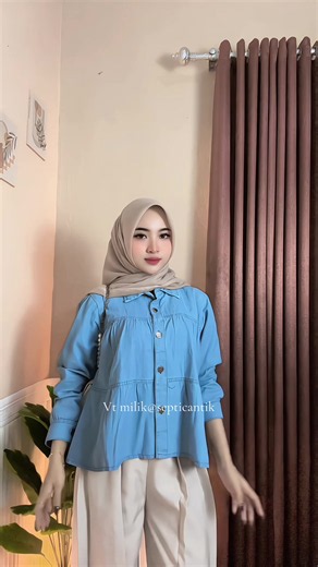 Atasan Ku blouse ruffle untuk dipadukan dengan jeans