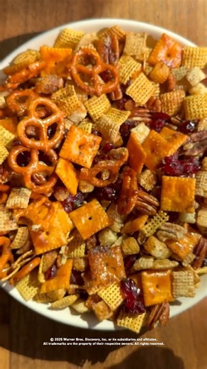 A big bowl of Thanksgiving Snack Mix is the perfect pre-dinner snack while the turkey roasts 😋 Get Kim Klatzkin's recipe: https://foodtv.com/4hHcqJB | Food Network