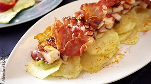 Traditional galician octopus with potatoes called "Pulpo a Feira" Stock Video