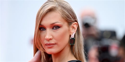 Bella Hadid Rocks Her Darkest Hair in Months Featuring Grown-Out Roots and a Bombshell Plunging Top