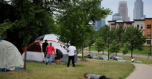 At a growing Minneapolis homeless camp, a glimmer of hope for struggling families