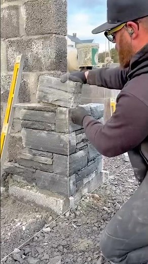 Building a sturdy stone pillar with precision stacking and alignment for strong foundation