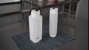 Restaurantware 32oz. FIFO Inverted Plastic Squeeze Bottle with Refill and Dispensing Lids - First In First Out - Perfect for Restaurants Catering and Food Trucks - 1ct box