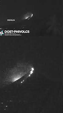 Meteor lights up sky above erupting volcano