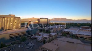 Sunset Time-lapse South Lake Tahoe, California resort city in the Sierra Nevada mountains. Known for ski resorts and beaches, like El Dorado Beach, with its picnic areas, restaurants, bars & casinos.