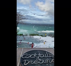 Tourists enjoy foam party at Boracay island in the Philippines