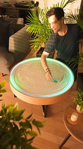 Imagine a coffee table that’s more than just furniture – it’s a mesmerizing work of art. Our Oasis kinetic art coffee table uses a small ball controlled by a hidden magnet to create intricate sand patterns that are soothing to watch. | Grounded Labs