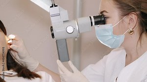 Ear, nose, throat examining. ENT doctor with a female patient and endoscope. Stock Video