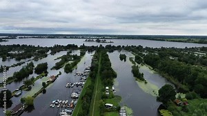 Moorings Over Floating Dutch Village Of Scheendijk Near Utrecht, North Holland, Netherlands. Aerial Drone Shot