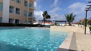 Own your private escape to paradise at Aruba's Life in Aruba. This stunning property features a spacious and inviting pool that is perfect for soaking up the Caribbean sun and taking a refreshing dip. Find out what Aruba's Life can offer you today! https://remaxaruba.com/arubas-life-condos #remaxaruba #remax #property #aruba #arubalife #realestate #agents #propertymanagement #vacationmode #CondoLiving #condoforsale #vacationhome #apartments | RE/MAX Aruba | Facebook