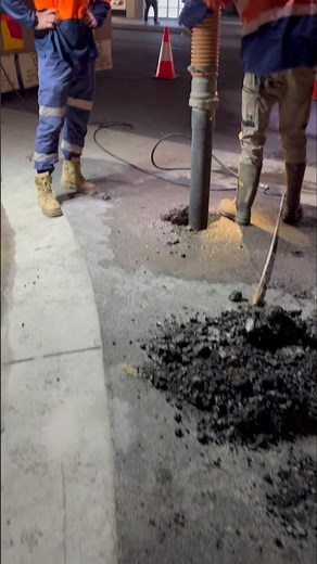 Safe utility potholing using a vacuum hose and high-pressured water