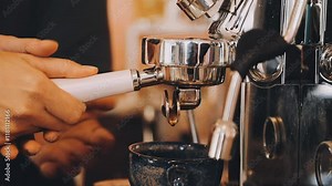 a work of a modern coffee machine in the process of making espresso