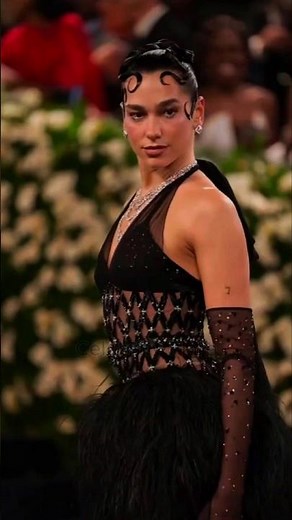 Dua Lipa Shines in Crystal-Adorned Chanel at Met Gala 2025