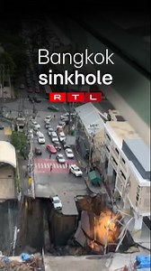 29K views · 105 reactions | Shocking scenes in Bangkok, Thailand: a section of road outside Vajira Hospital suddenly collapsed, leaving a massive hole dozens of meters deep. Onlookers can be heard screaming as the ground gave way in the busy residential district. #Bangkok #Thailand #RoadCollapse #AFP #RTLtoday #internationalnews | RTL Today | Facebook