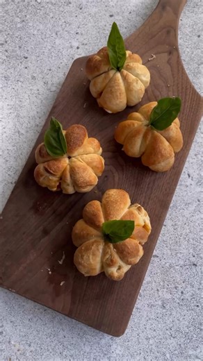 Halloween is fast approaching, but these pumpkin appetizers are ready to party! 🎃 🧀 Thanks to makefoodlovely for this lovely idea! | Pillsbury