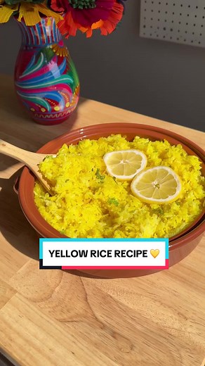 Yellow Rice 💛 is a side dish I've been eating a lot lately. It's so delicious! Here is what you need to make this healthy and incredible recipe 👇🏼 3 Tbsp Olive Oil 1/4 Chopped Small Onion 3 Minced Garlic Cloves 3/4 Tsp Turmeric 2 Cups Rice 3 Cups Water 1/8 Cup Lemon Juice The Zest of 1/2 Lemon 2 Tbsp Chicken Bouillon Paste 1/2 Tsp Salt 1/8 Tsp Black Pepper Garnish with Cilantro I love pairing this side dish with seafood and veggies! I hope you enjoyed the recipe 🥰 #yellowrice #recipe #health