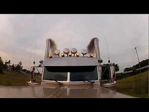 Pullin out of truck stop blowin a lil smoke.