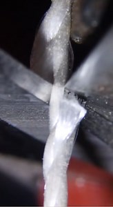 Cutting Thread with Scissors: Extreme Close-Up