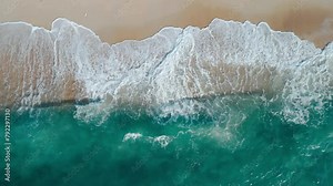 Mesmerizing ocean waves sandy shoreline aerial top view. Expanse ocean majestic waves sandy beach serene retreat Waves caress ocean edge beauty oceanic coast tranquility of coastal landscape.