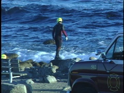 Archival Footage: Investigators gather wreckage from John Denver's plane crash (1997)