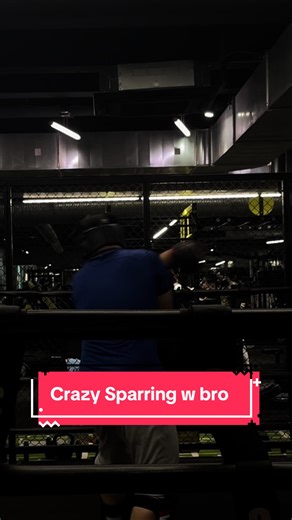 Intense Sparring Session: Unforgettable Helmet Punch