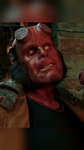 Hellboy interrogates a troll-market for the tooth-fairies’ buyer