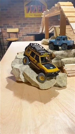 rc fms land rover on mini crawler rock course