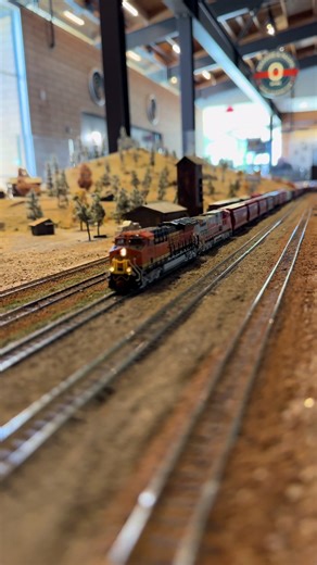 A long grain train with four @ScaleTrains locomotives meander through northern Arizona. #trains #railroad #nscale #nscaletrains #modeltrains #arizona #bnsf #bnsfrailroad #freighttrain