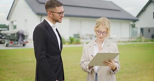 Real Estate Agent Signs Contract with Client