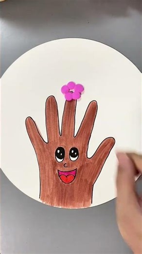 Lets make a beautiful spring tree craft with your child using their palm prints for Arbor