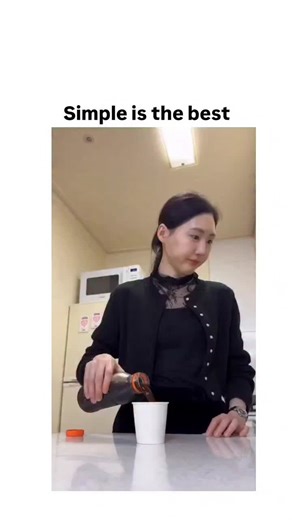 Warm Vibes ✨ on Instagram: "This viral video, viewed over 1.8 million times, depicts a Korean couple playfully crafting a paper handle for a disposable cup to hold hot coffee, embodying effortless ingenuity in daily life. The caption "Simple is the best " underscores the post's theme of cherishing uncomplicated joys, sparking 10,000+ likes and Indonesian replies praising its cute, practical hack. As a repost by , it taps into wholesome relationship content trends, fostering community engagement