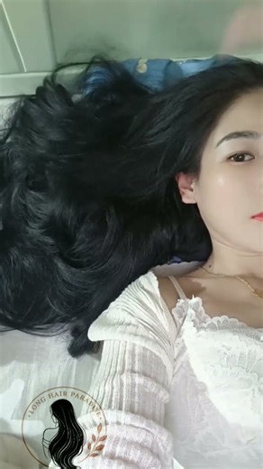 Showing Off Her Super Long Hair While Lying Down