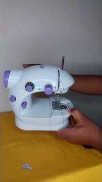 How to thread the bobbin thread on a mini portable sewing machine?