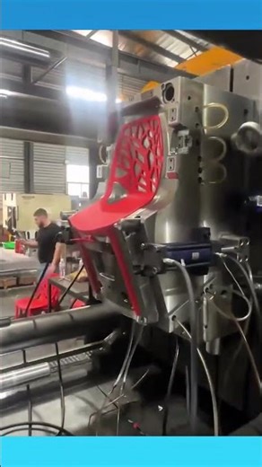 A molding machine shaping melted plastic into durable, perfectly formed chair frames.