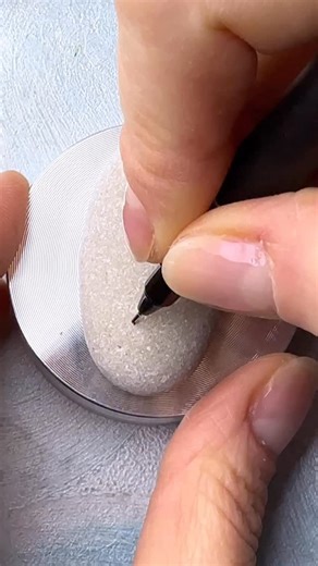 2.2K views · 1.5K reactions | #Inktober2025 is just around the corner! I always start with a signature stone and this year is no different. For a month I’ll be drawing patterns from my e-book (link in bio) on smooth sea pebbles. ✨✨ #zenart #doodling #paintedrock UniPin fine liner 0.1, Pentel color pencils.  Wild blossoms in a rainy day | Alena Light draws | Facebook