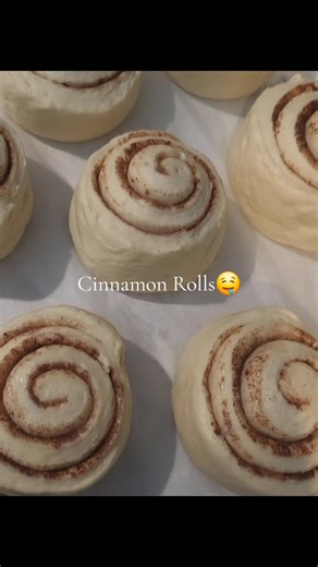 Cinnamon Rolls Recipe ​Ingredients ​For the Dough: ​Warm milk: 240ml ​Active dry yeast: 7g (1 packet) ​Sugar: 100g ​Butter (melted): 75g ​Egg: 1 large ​All-purpose flour: 500g to 560g (start with 500g) ​Salt: 6g ​For the Filling: ​Butter (softened): 115g ​Brown sugar: 200g ​Cinnamon: 20g ( 2.5 tbsp) ​For the Frosting: ​Cream cheese: 120g ​Butter (softened): 60g ​Powdered sugar: 180g ​Heavy cream: 15-30g Instructions ​Dough: Mix warm milk, yeast, and a bit of sugar. Let sit for 10 mins. Add the r