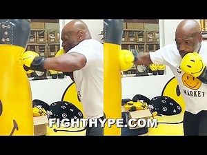 MIKE TYSON BATTERS HEAVY BAG WITH A SMILE; LEGENDARY POWER STILL FRIGHTENING AT AGE 53