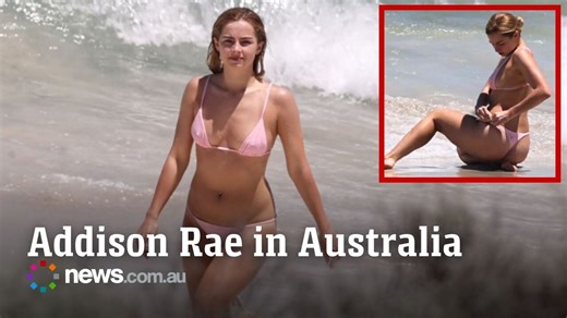 Addison Rae sizzles on Aussie beach in skimpy bikini
