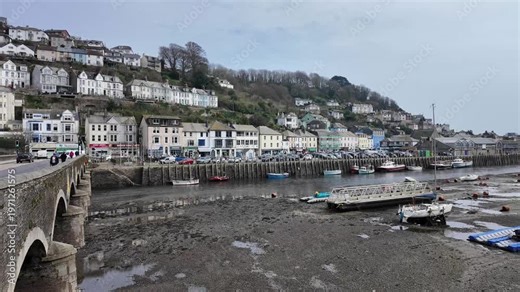 Looe Cornwall England UK. 23.03.2026. Video. Low water at Looe Cornwall showing the orange buoys on the seabed on a dull day in early spring.