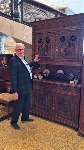 Have you ever seen carvings tell a whole life story? Ken’s taking a closer look at this 1890s French oak sideboard, where skilled artisans filled every inch with meaning. From village scenes and traditional wooden shoes to the bride and groom figures, this piece was made as a wedding dowry to celebrate a new beginning! #FrenchAntique #BrittanyFurniture #HandCarvedOak #AntiqueSideboard #WeddingDowry #HarpGallery | Harp Gallery Antique Furniture