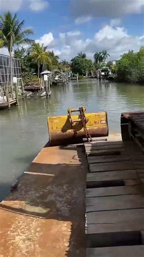 Grinding Limestone At the Bottom of a Florida Canal With the Help of GPS.