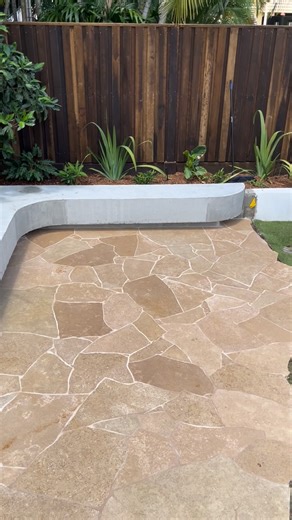 Hillan Stone & Tile on Instagram: "An outdoor space made for slowing down.. 🍃☀️ #tiling #limestone #crazypave #brisbanetiler #stonemason"