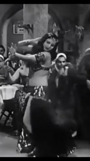 During the golden era (1930–1950), Egyptian cinema was booming. It became the third largest in the world. Today, we’re sharing a clip from Aziza, featuring the legendary Naima Akef. 🪙 Learn to dance like her at RaqsOnline.com #RaqsOnline #goldenera #goldenerabellydance #bellydance #bellydancer #dancer #dancing #danceclass #onlineclass #bellydanceonlineclasses #bellydance | Raqs Online