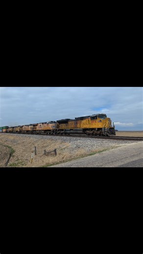Midwest Railroads on Instagram: "The only way to see an entire 7-Engine, 3-Minute train in 90 Seconds is at 1.8X speed. Enjoy! Union Pacific SD70ACe No. 8516 leads a 5-Engine consist up front with two mid-train DPU's hauling a massive Union Pacific domestic Intermodal train heading east toward Princeville, IL on March 29, 2025. #trains #railroad #freighttrain #trainspotting #railway"