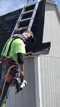 Installing shingles on mansard shed