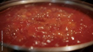 Delicious traditional Mexican pozole boiling in cooking pot