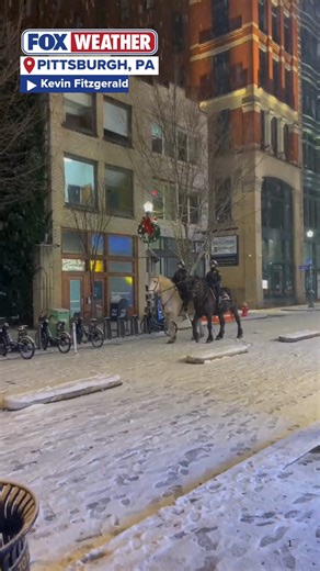 HORSIN' AROUND 🐴 : Two patrol horses took to the streets in downtown Pittsburgh on New Year's Eve to trot the snow-covered street in The Steel City. | FOX Weather