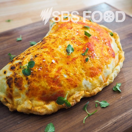 Silvia Colloca doesn't like her gluten-intolderant friends to miss out so she developed this recipe for a hot, cheesy calzone. Catch Cook like an Italian 8pm Thursdays on SBS Food and streaming free on SBS On Demand. sbs.com.au/food/recipes/gluten-free-calzone | SBS Food