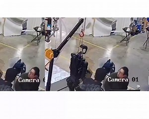 Chilling moment humanoid robot wakes up and starts attacking its handlers while trying to break free from restraints A humanoid robot’s alarming incident was caught on camera in a factory in China, where it was seen attacking its handlers while trying to break free from restraints. In the CCTV footage below. the black robot could be seen attached to a miniature crane before it suddenly began swinging its arms back and forth. As it flew into a rage and lashed out, a man seated at a computer swift