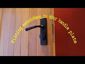 Fitting escutcheon to front door handle plate and insulating